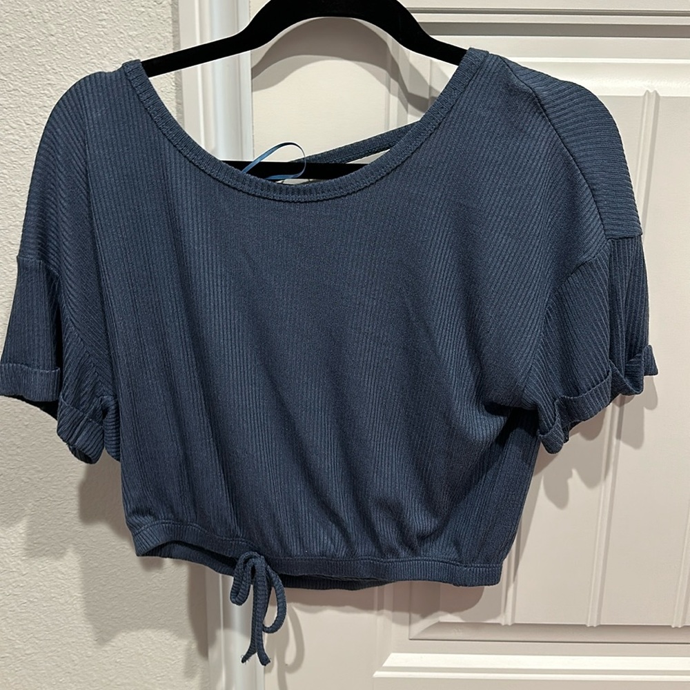 Blue open back shirt